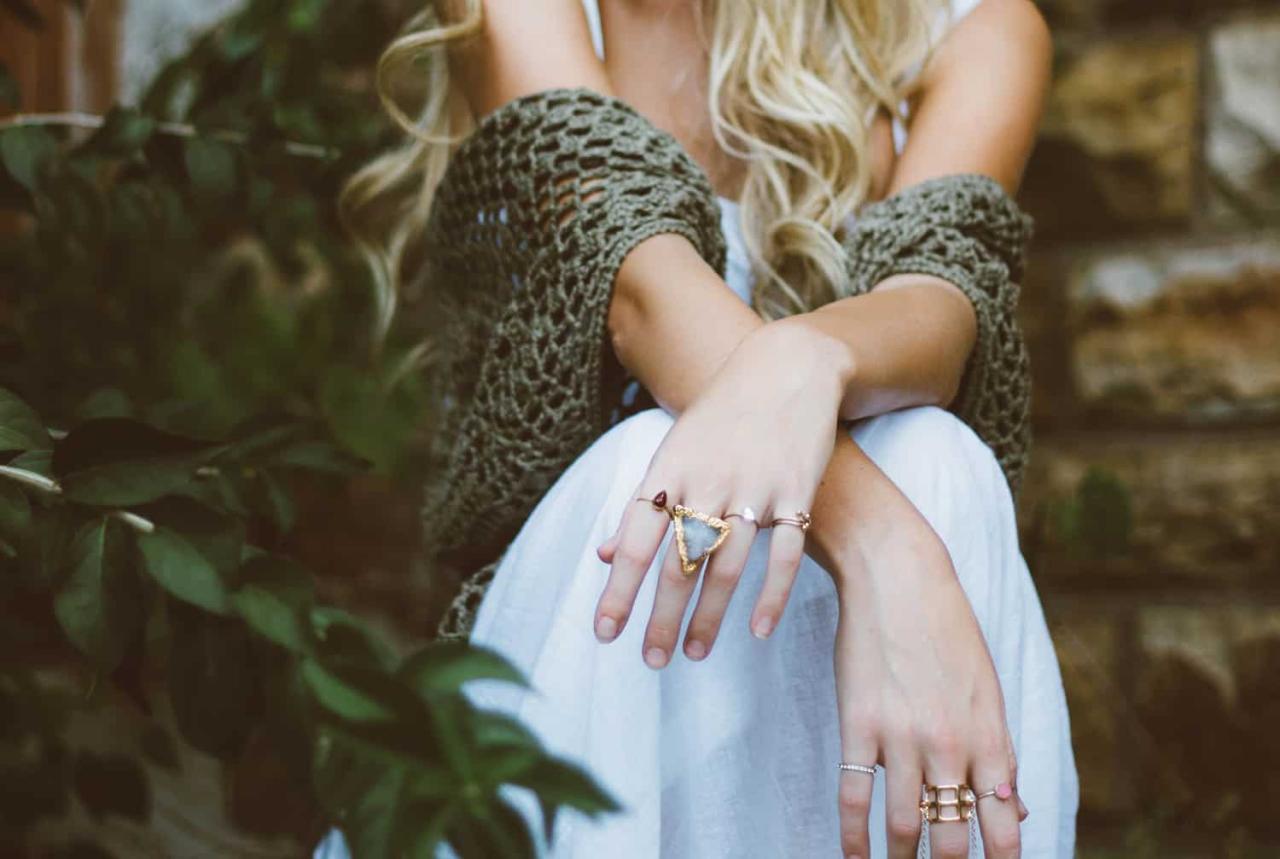 modern bohemian lifestyle woman with rings and shawl